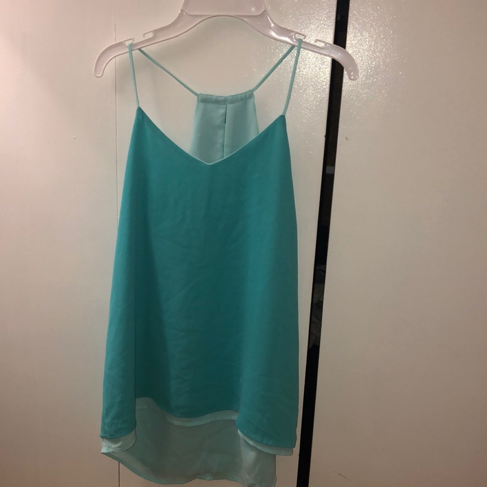 Turquoise tank top.